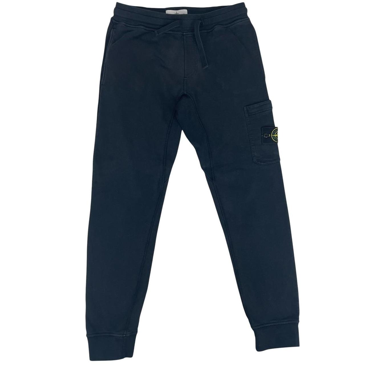 Stone Island navy blue joggers with logo patch and cotton material, pre-owned condition.