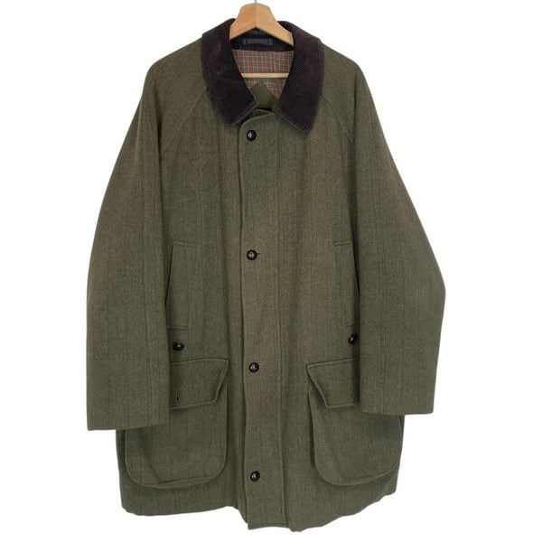 Barbour green tweed wool coat with classic pattern and missing front pocket button.