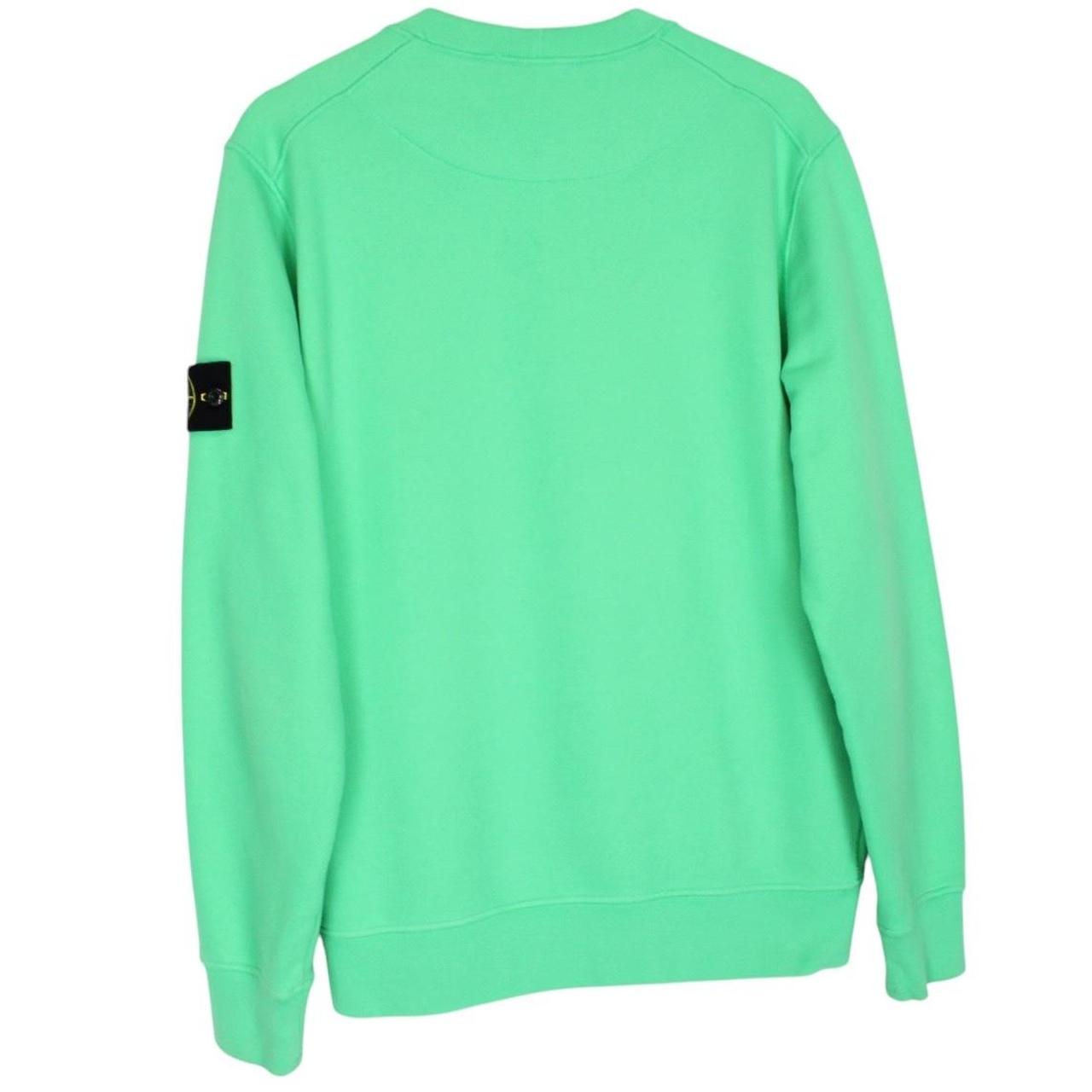 Stone Island green cotton sweatshirt with iconic compass logo and ribbed cuffs.