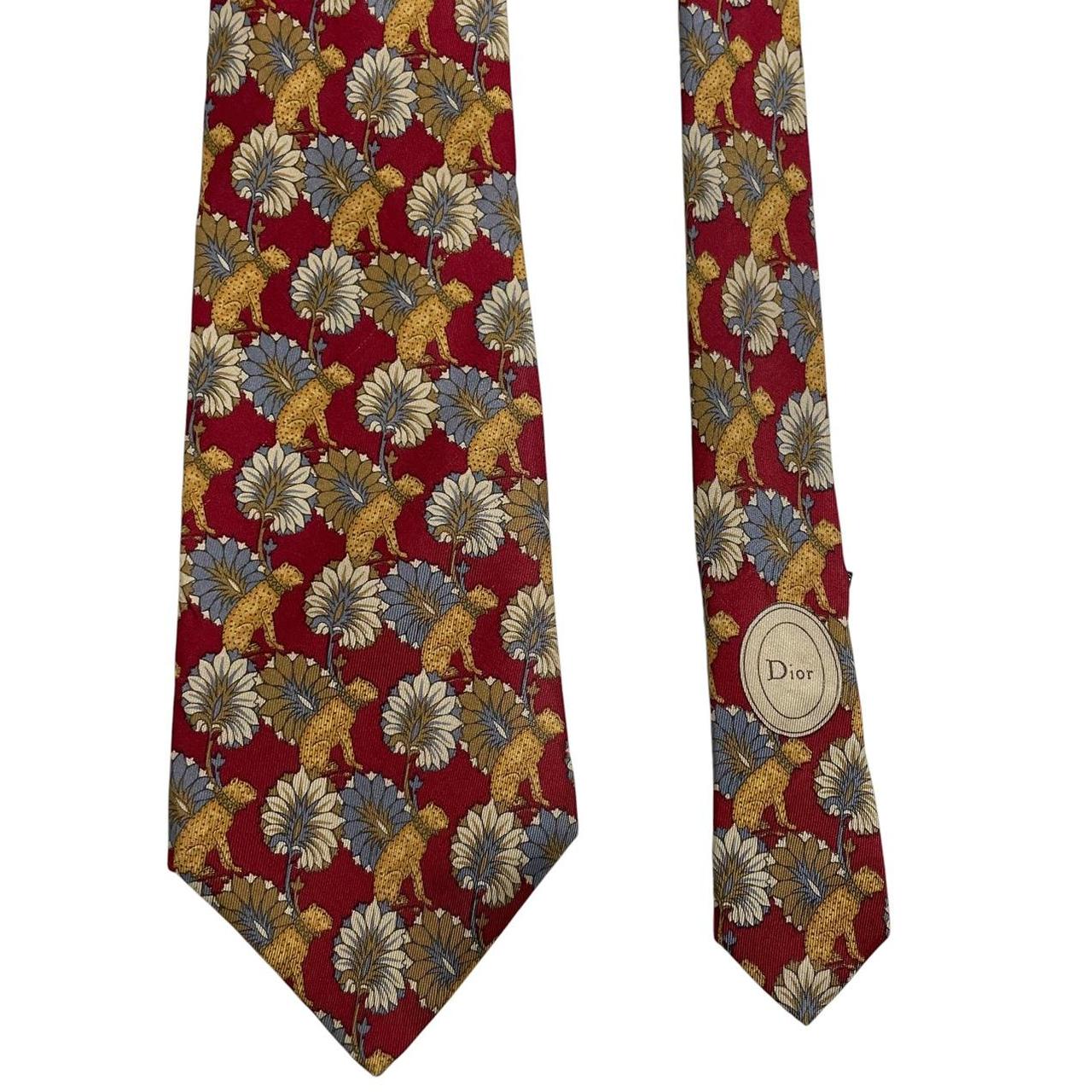 Christian Dior multicoloured silk tie featuring leopard print pattern and logo detail.