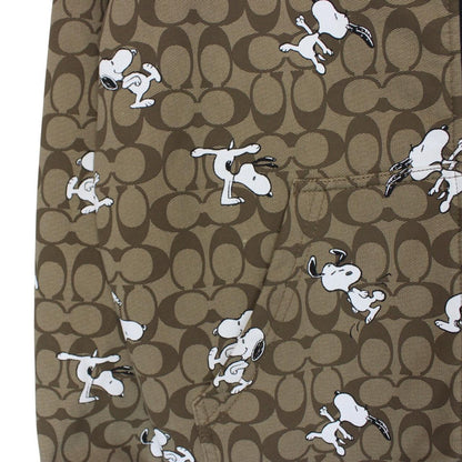 Coach brown hoodie featuring Peanuts Snoopy graphic and full zip design.
