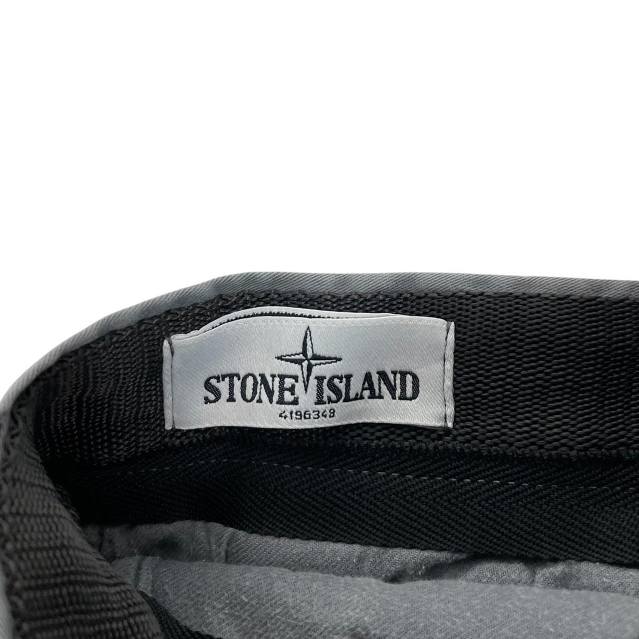 Stone Island grey slim fit cotton trousers with logo patch and classic design.