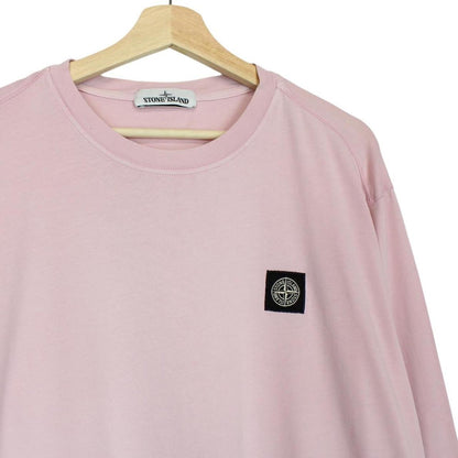 Stone Island pink long sleeve t-shirt with compass logo and pocket detail.