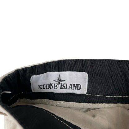 Stone Island beige cargo shorts with logo patch and cotton material.