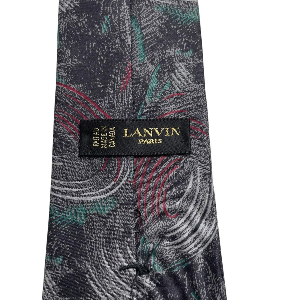Lanvin multicoloured abstract print silk tie featuring vibrant patterns in black, green, and red.