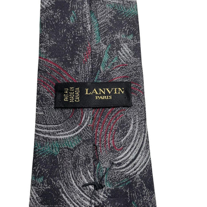 Lanvin multicoloured abstract print silk tie featuring vibrant patterns in black, green, and red.