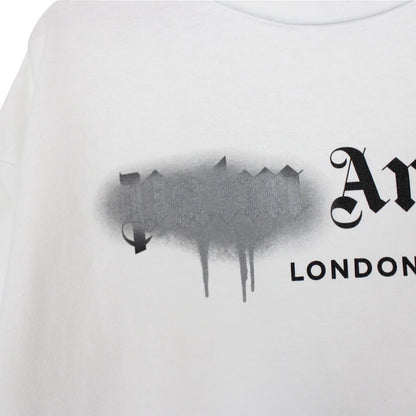 Palm Angels white cotton t-shirt with sprayed print and chest pocket detail.