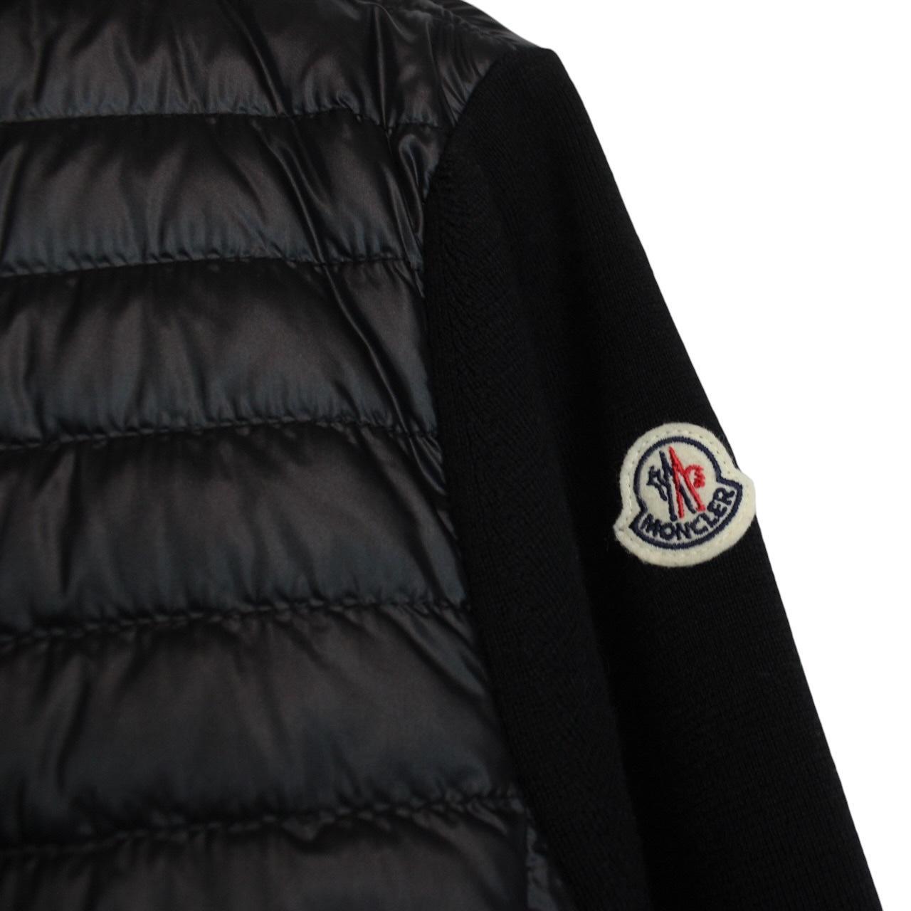 Moncler black cardigan jacket with full zip, down tricot material, and logo detail.