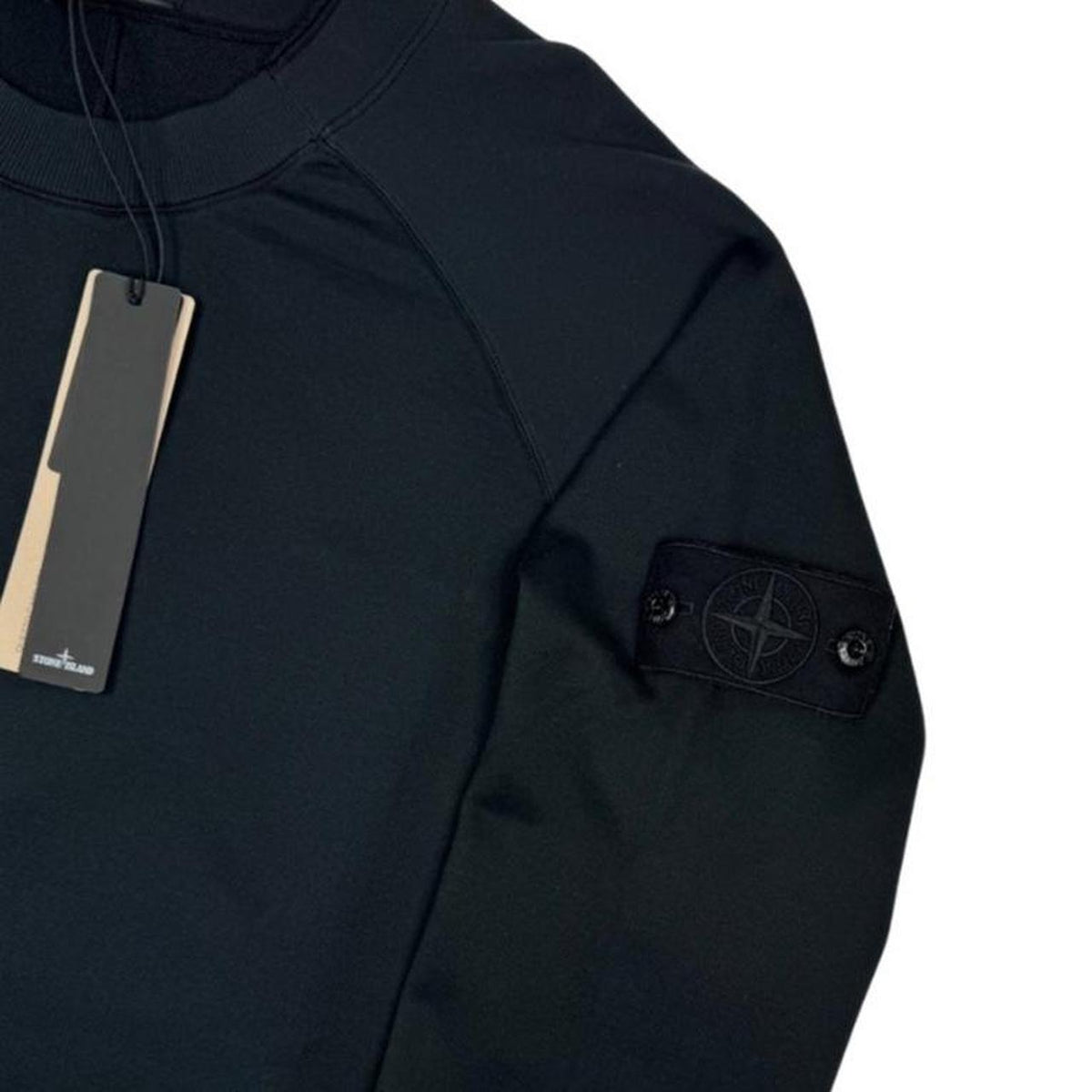 Stone Island black sweatshirt with ghost logo and stretch cotton material.