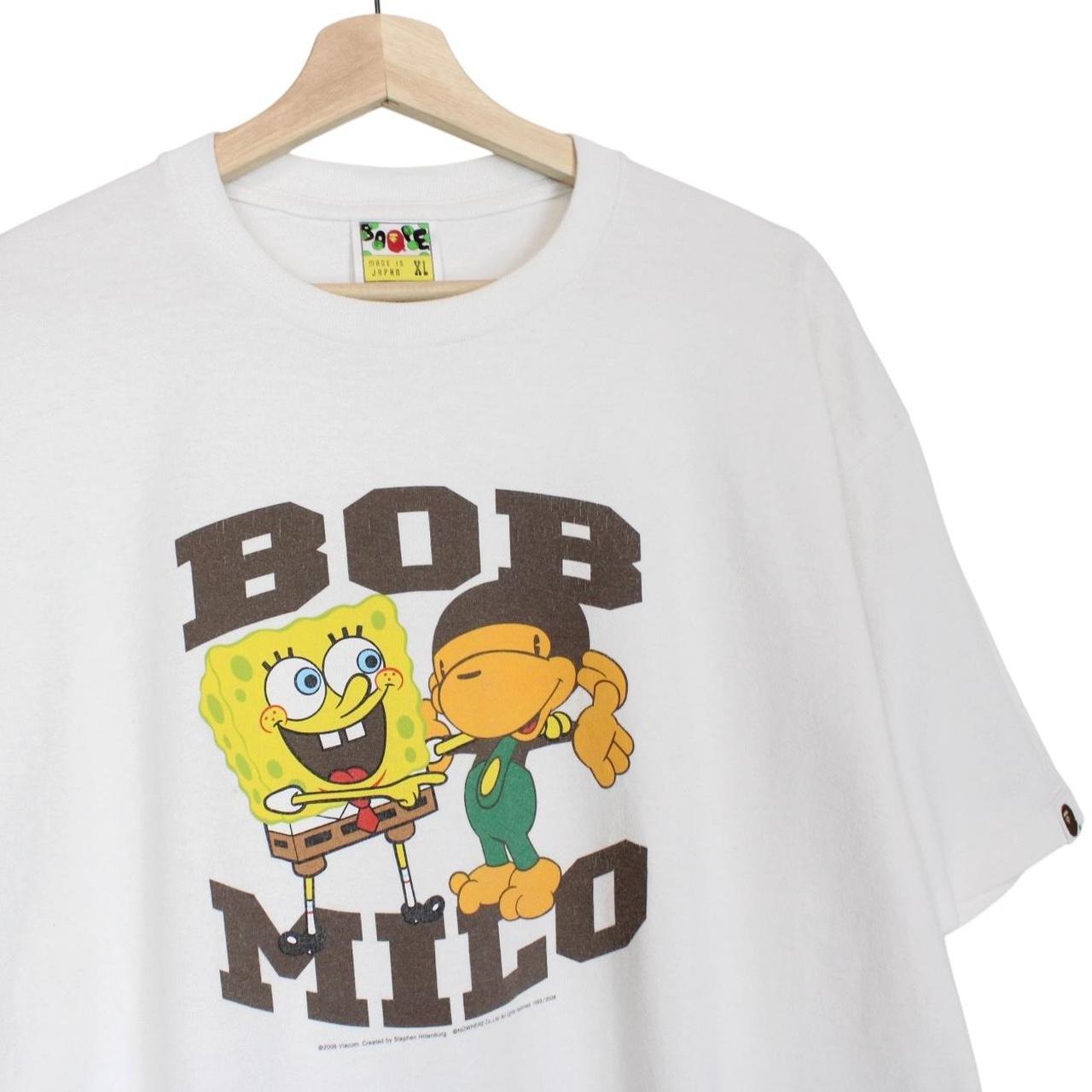 BAPE white graphic t-shirt featuring Spongebob Milo Bob print and pocket detail.