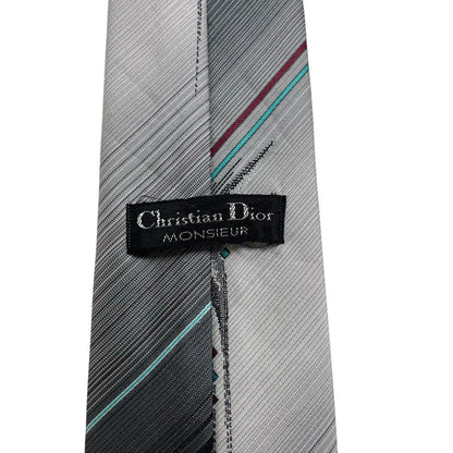 Christian Dior grey and black gradient tie, smooth polyester with subtle color transition.