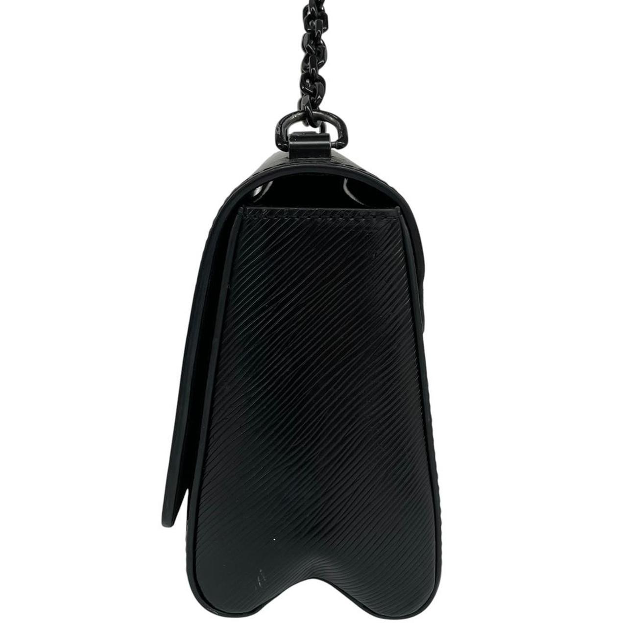Louis Vuitton black Epi leather duffel bag with twist lock and visible wear.