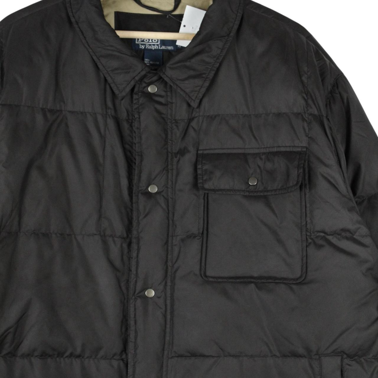 Polo Ralph Lauren black down jacket with logo patch and oversized fit.
