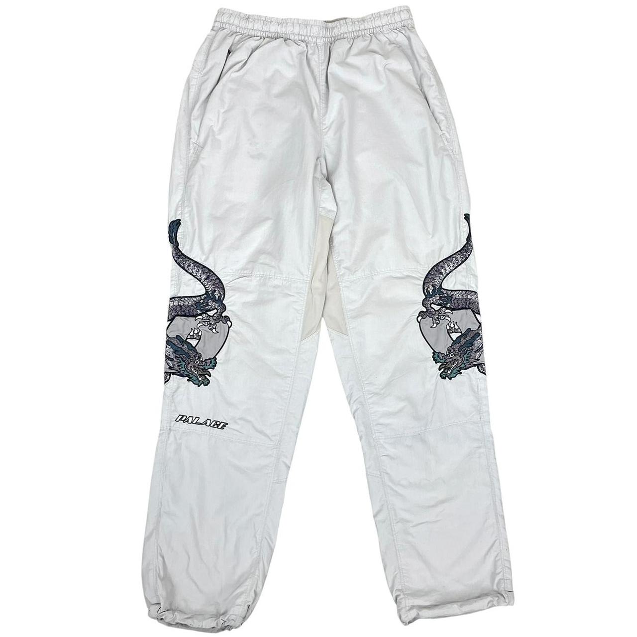 Palace grey joggers embroidered dragon design, made of nylon, size medium.