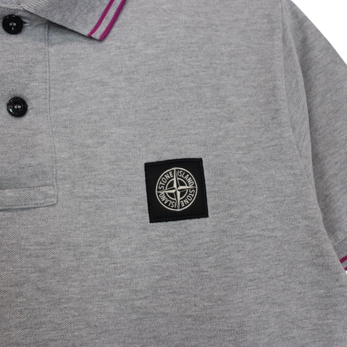 Stone Island grey polo shirt with embroidered compass logo and cotton material.