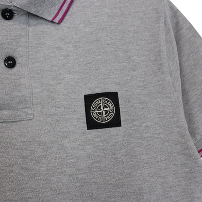 Stone Island grey polo shirt with embroidered compass logo and cotton material.