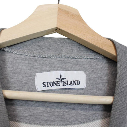 Stone Island grey cotton sweatshirt with logo patch and soft texture.