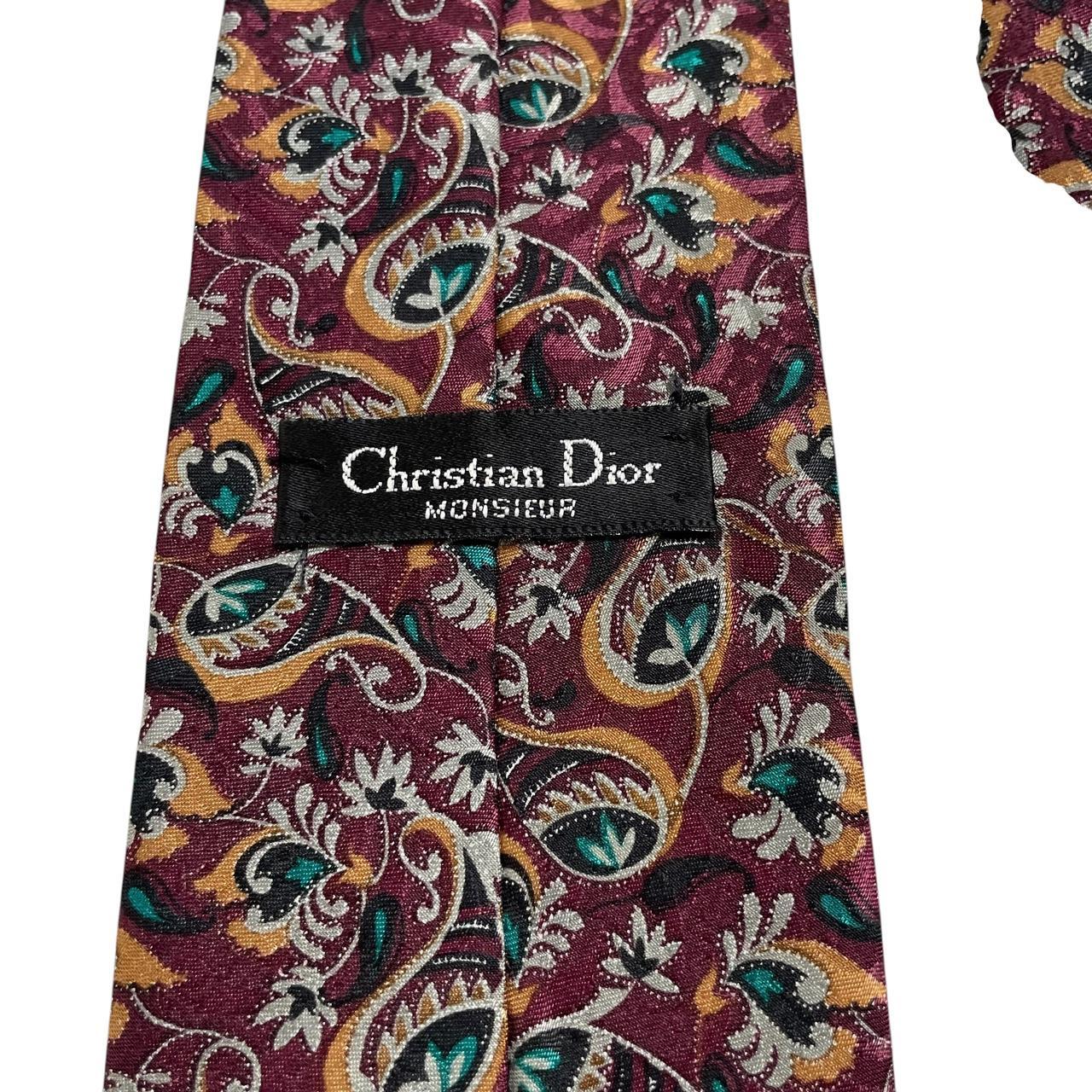 Christian Dior multicoloured floral print tie, polyester material, vibrant patterns throughout.