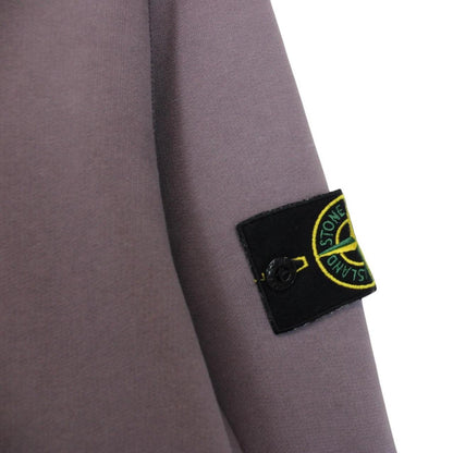 Stone Island pink sweatshirt with logo patch and soft cotton material.