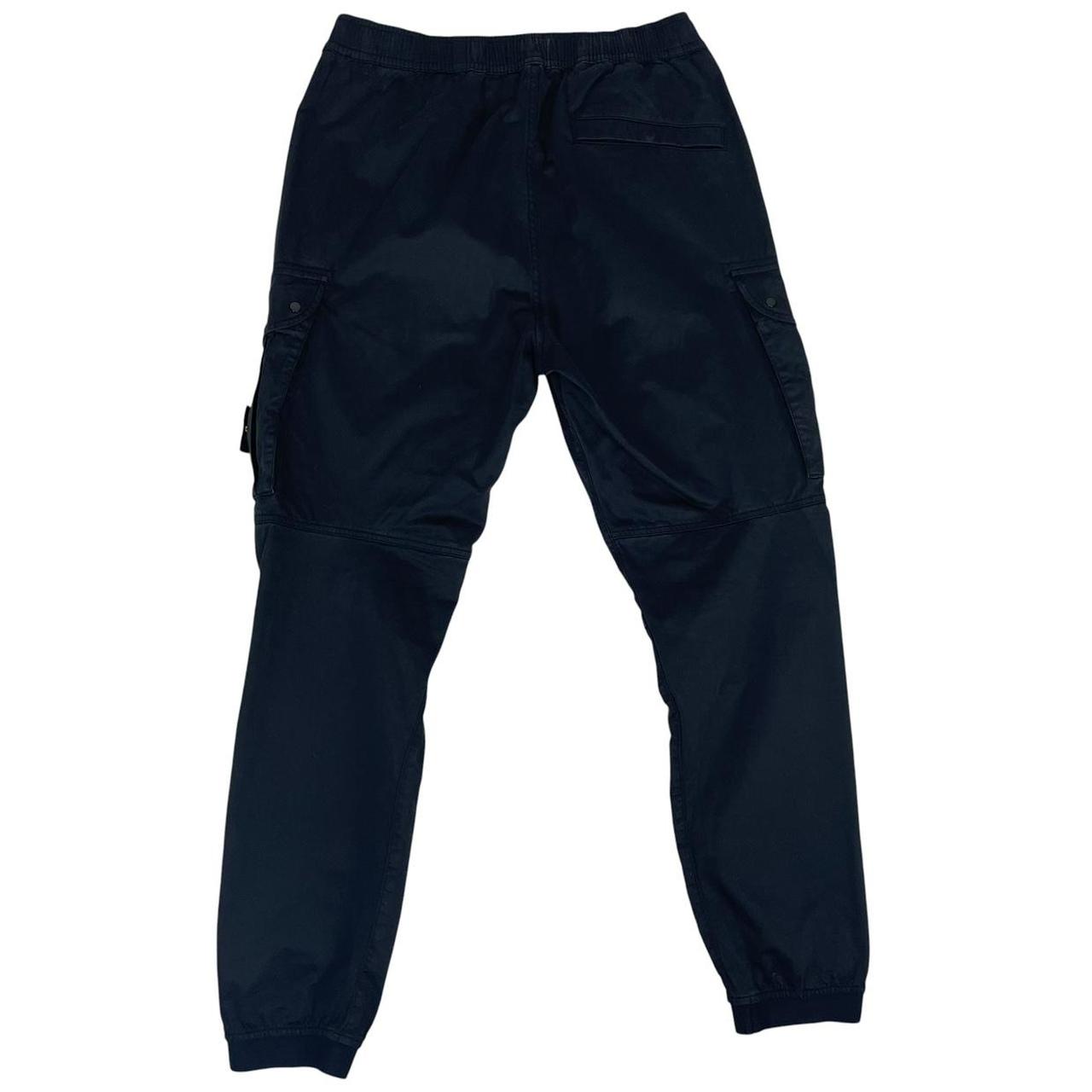 Stone Island black cargo trousers with logo patch and RE-T Fit design.