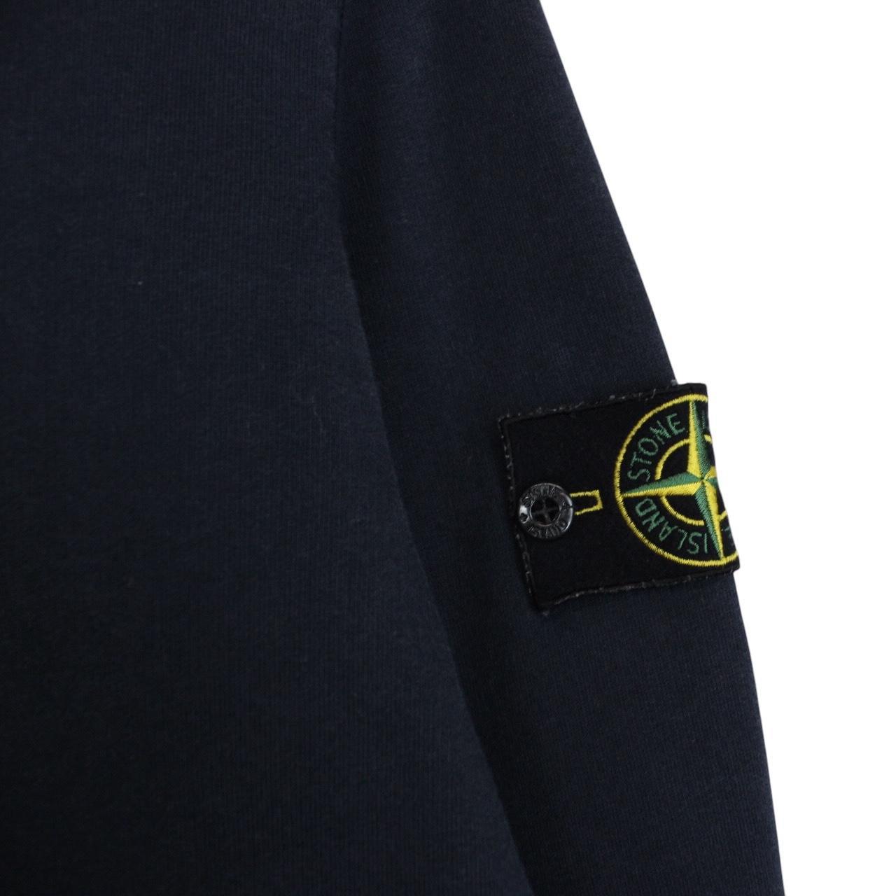 Stone Island navy blue cotton sweatshirt with iconic compass logo and ribbed cuffs.