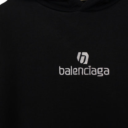 Balenciaga black and white cotton hoodie with sponsor logo and large fit.
