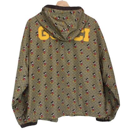 Gucci x Disney khaki brown windbreaker jacket with monogram pattern and nylon material.