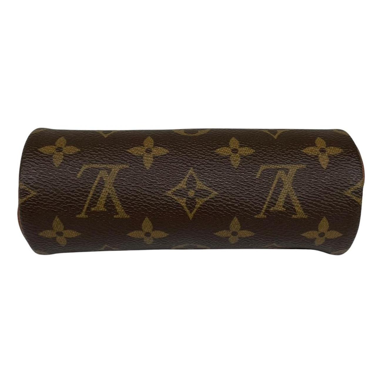 Louis Vuitton brown and tan duffel bag with monogram canvas and logo details.