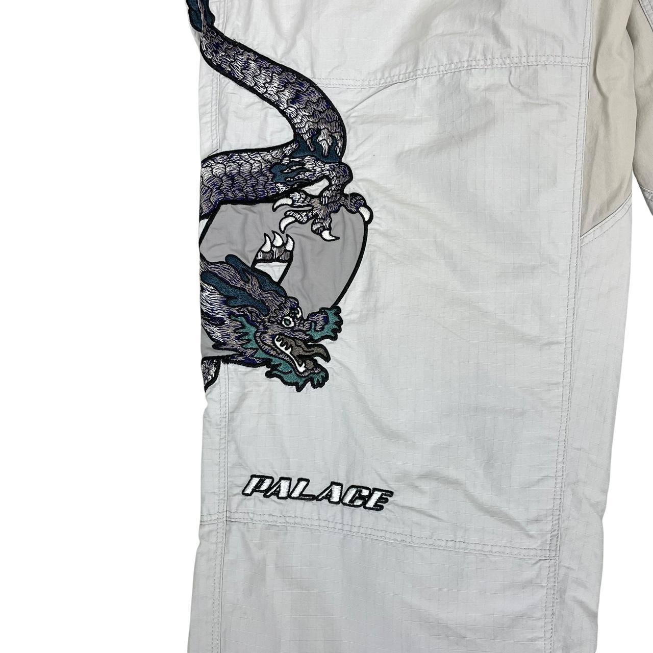 Palace grey joggers embroidered dragon design, made of nylon, size medium.