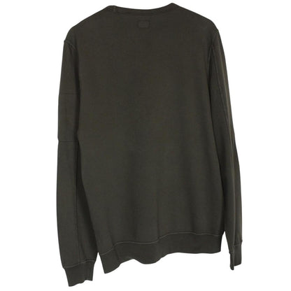 CP Company khaki green sweatshirt with goggle lens detail and cotton material.