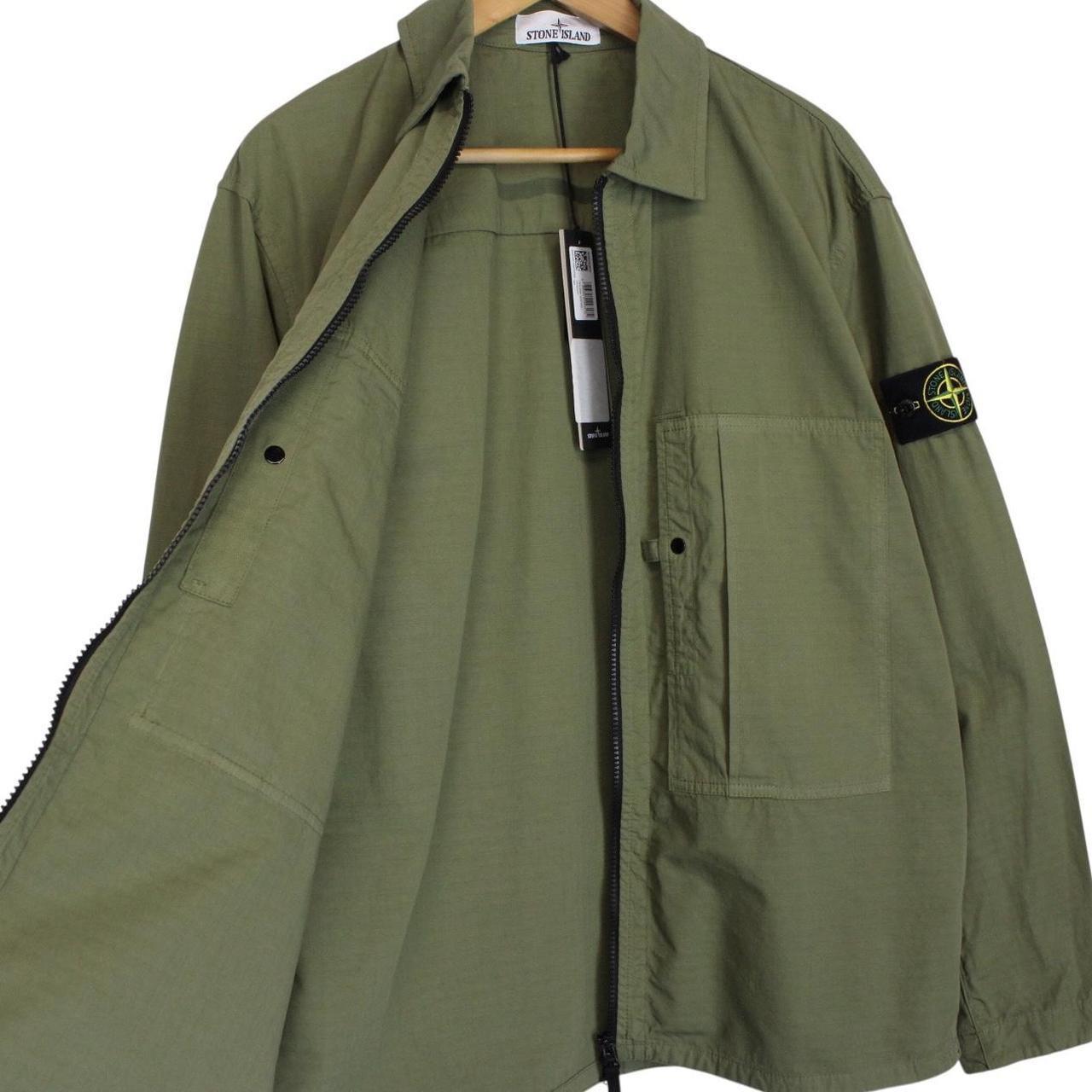 Stone Island green ripstop full zip overshirt jacket with logo patch and cotton material.