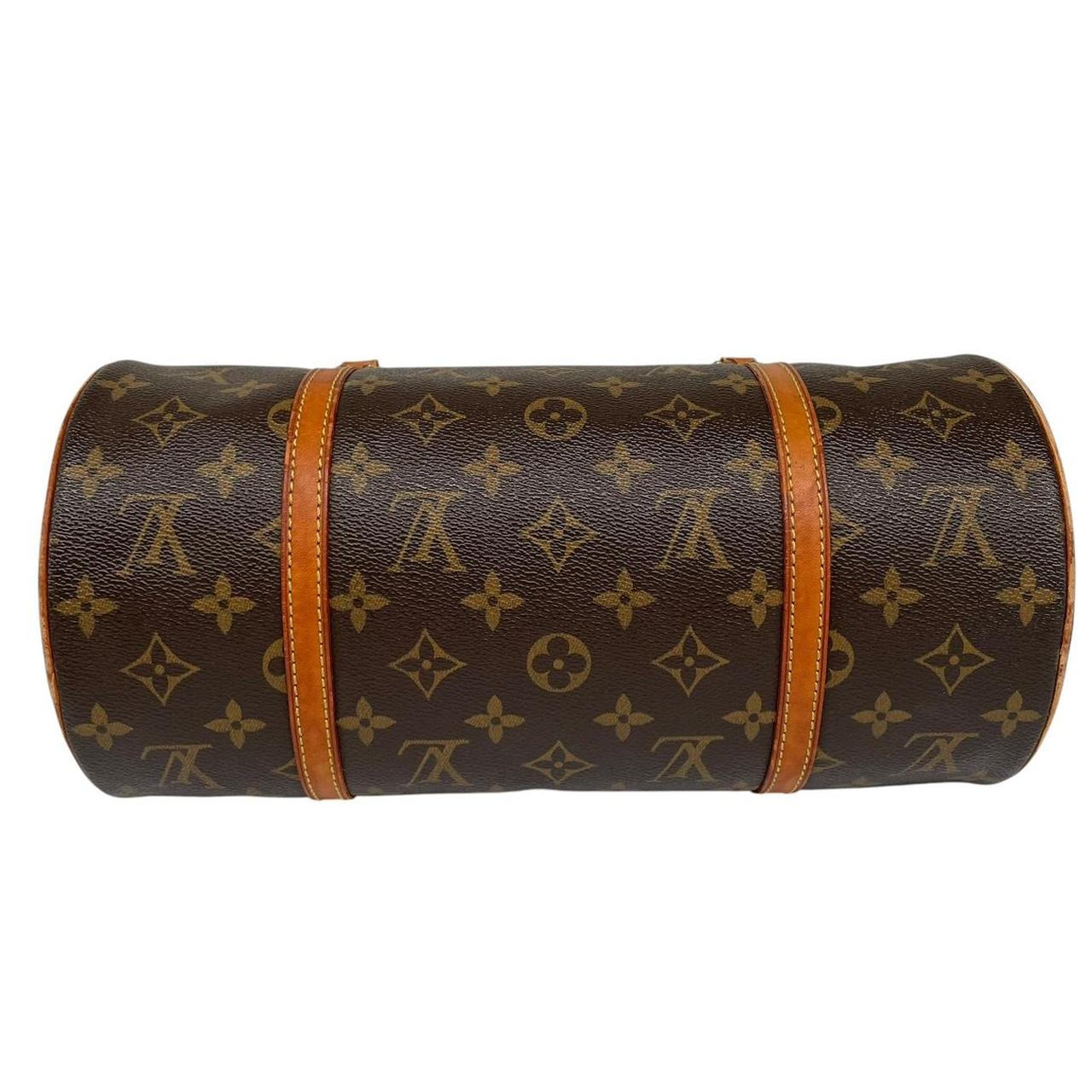 Louis Vuitton duffel bag brown and tan monogram canvas with logo and piping details.