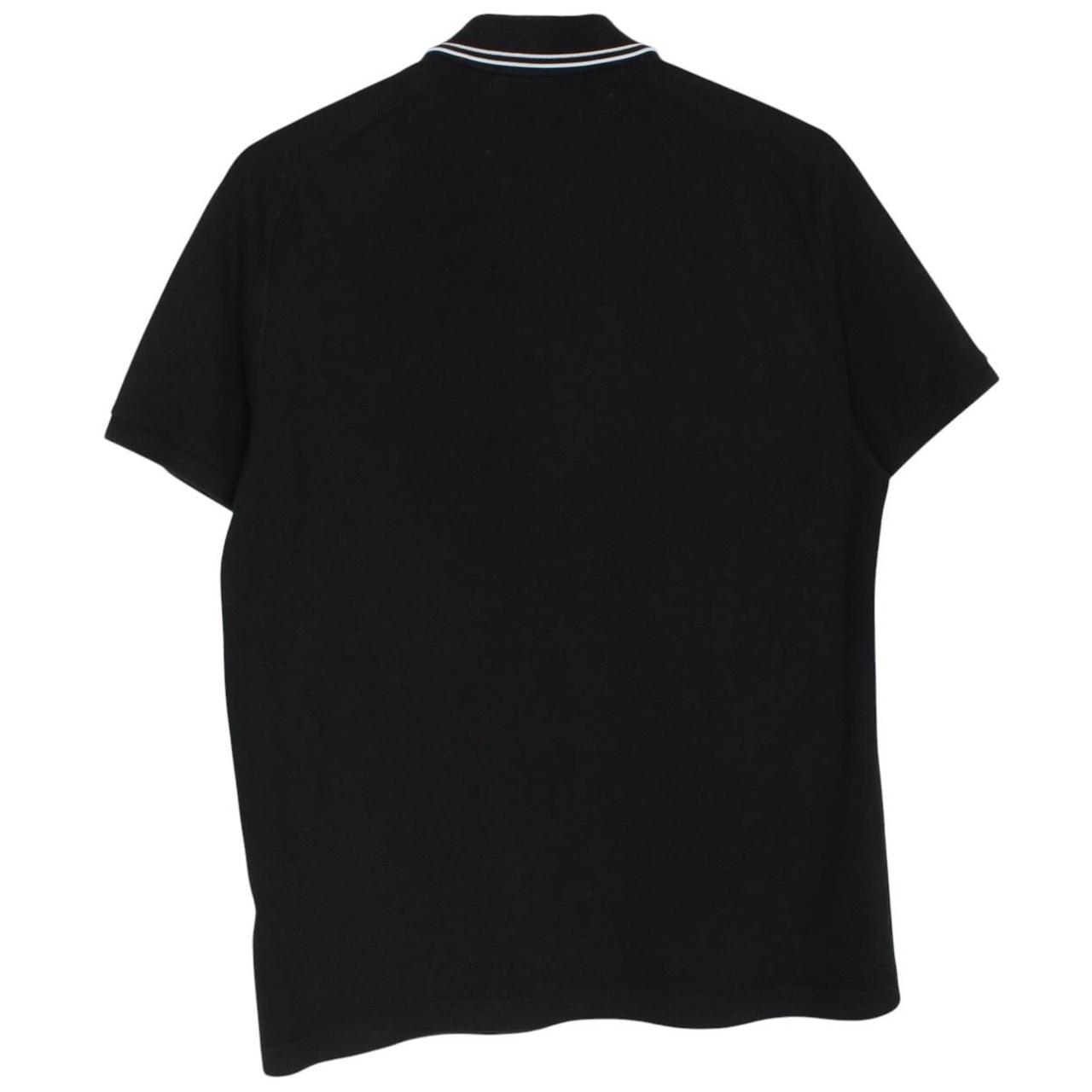 Stone Island black polo shirt with embroidered compass logo and cotton material.