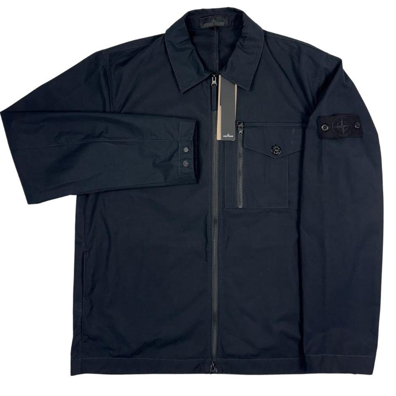 Stone Island navy blue waterproof overshirt jacket with ghost logo and cotton material.