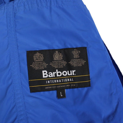 Barbour blue nylon multi-pocket jacket with logo detailing and scuff on bottom right pocket.