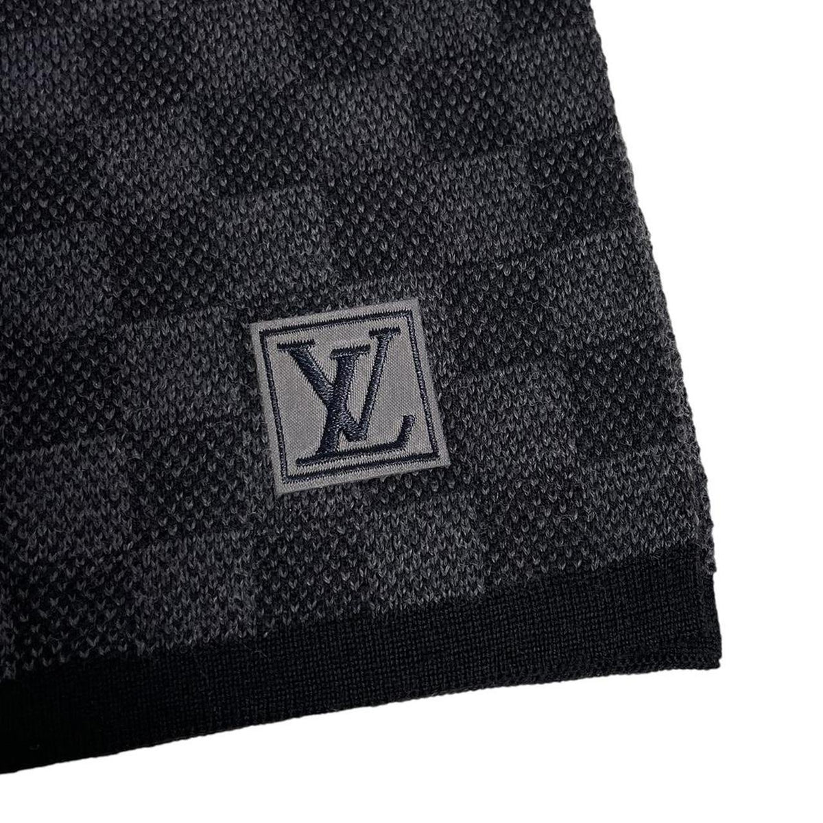 Louis Vuitton wool scarf black grey Damier pattern with tags and logo.