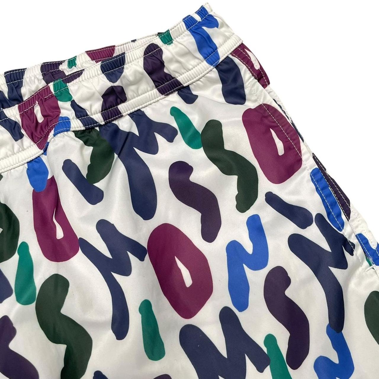 Missoni multicoloured zigzag print nylon swim shorts with logo detail.