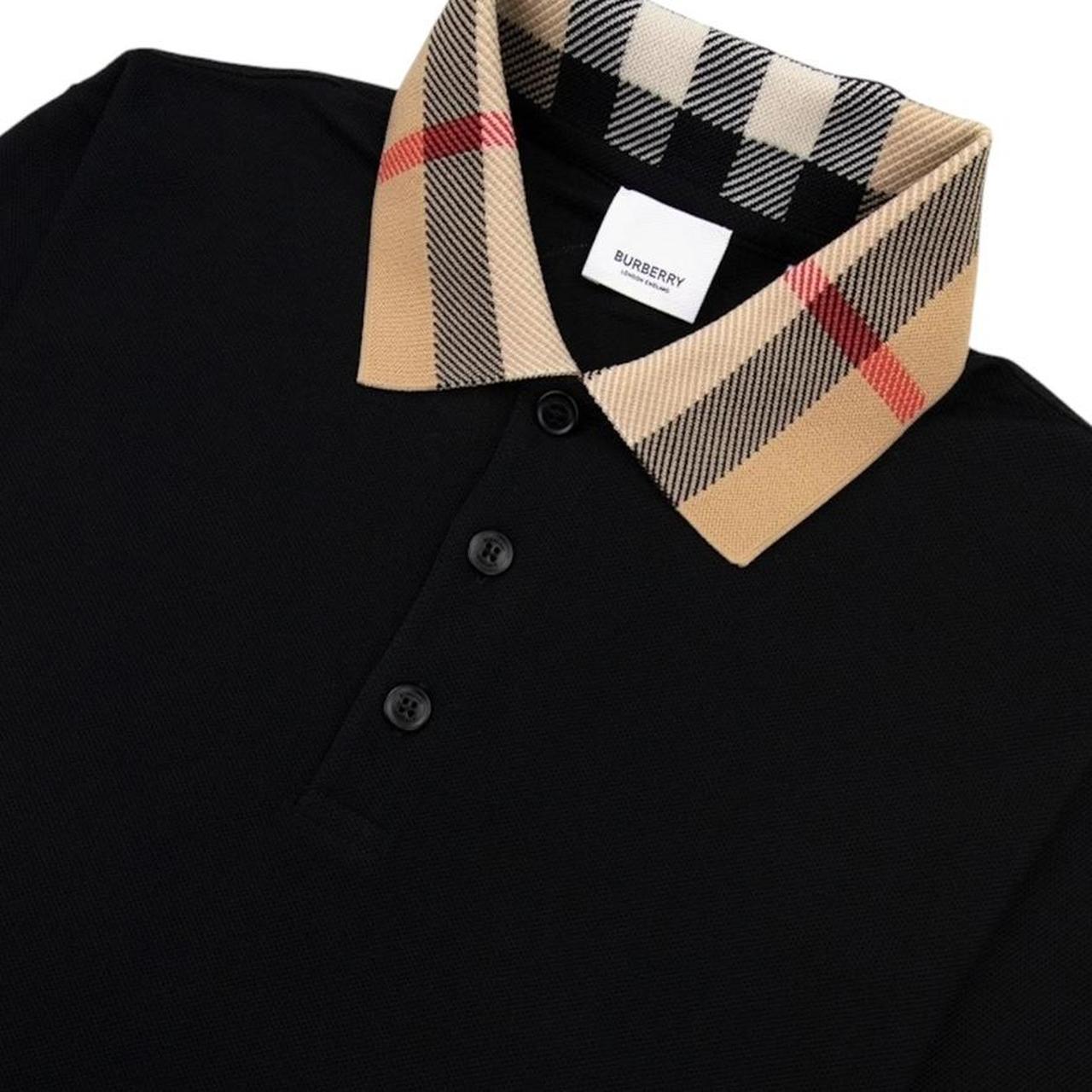 Burberry beige polo shirt with black Nova Check collar and cotton material.