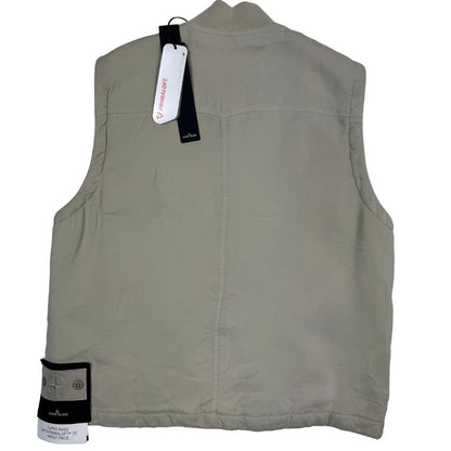 Stone Island beige vest jacket with logo patch and Primaloft material.