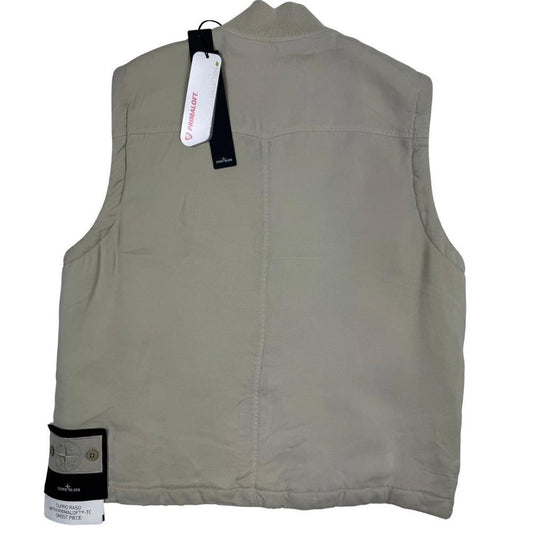 Stone Island beige vest jacket with logo patch and Primaloft material.