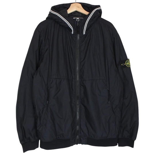 Stone Island black jacket with crinkle texture and logo patch on sleeve.