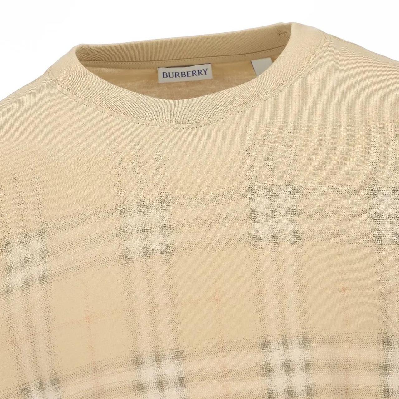 Burberry beige pocket t-shirt with gradient Nova Check pattern and crew neckline.