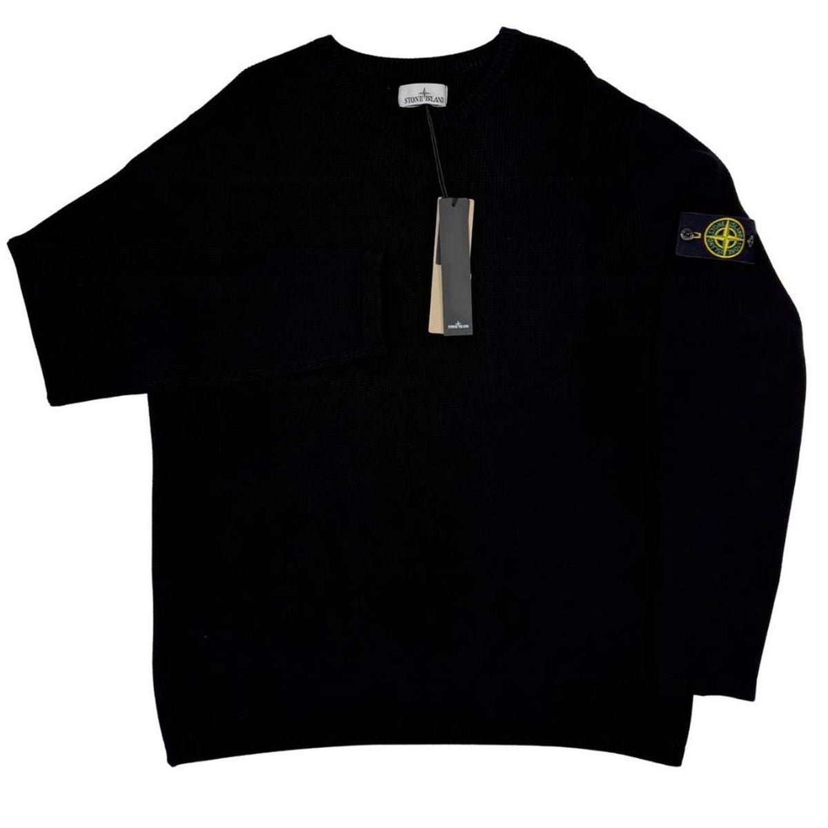 Stone Island black ribbed knit jumper with logo badge and organic cotton material.