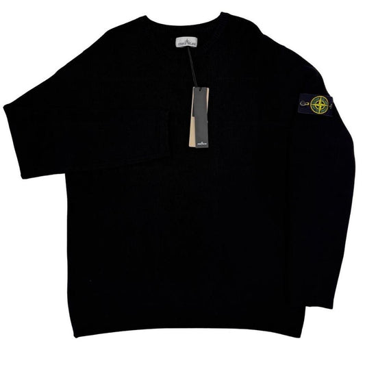 Stone Island black ribbed knit jumper with logo badge and organic cotton material.