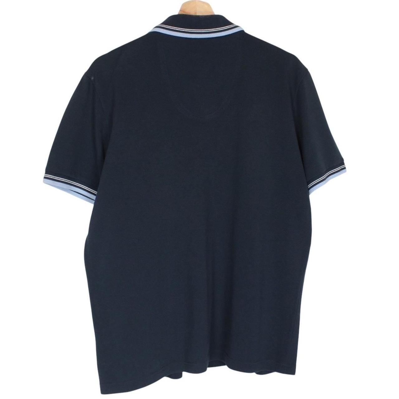 Hugo Boss navy blue short sleeve polo shirt with embroidered logo and cotton material.