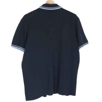 Hugo Boss navy blue short sleeve polo shirt with embroidered logo and cotton material.