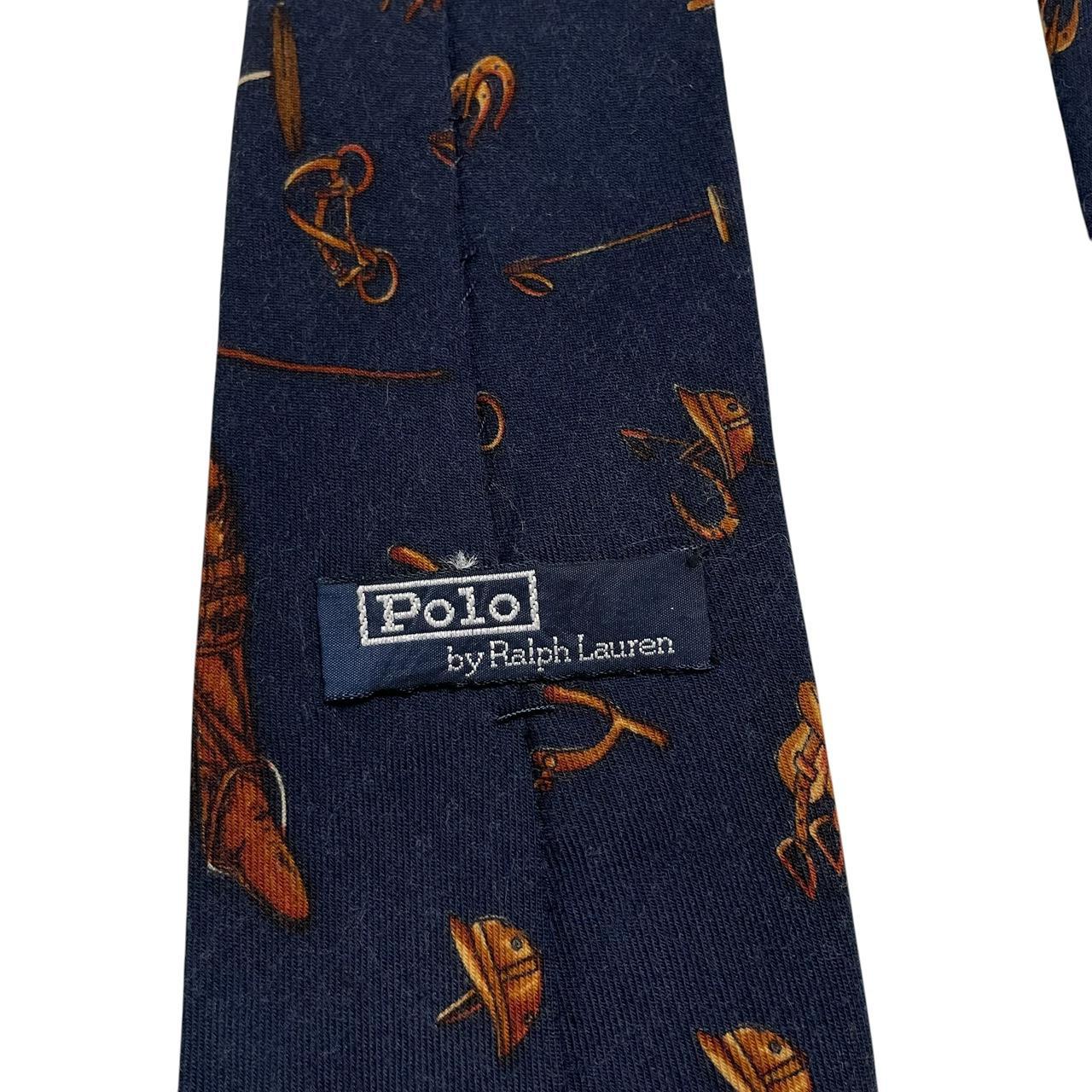 Polo Ralph Lauren navy blue wool tie with equestrian print pattern.
