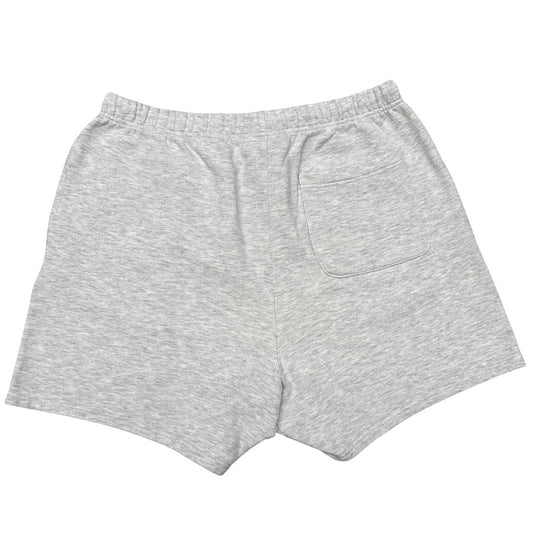 Essentials grey jogger shorts cotton material with logo detail and relaxed fit.