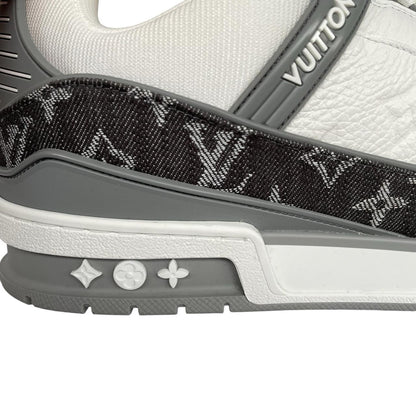 Louis Vuitton grey and white trainers with monogram pattern and leather accents.