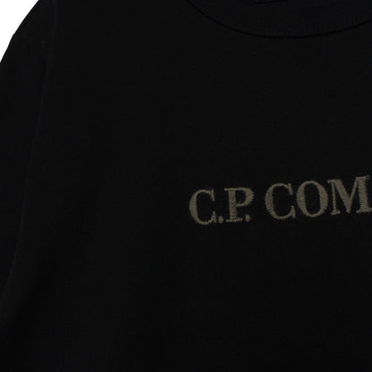CP Company black pocket t-shirt with embroidered logo and mercerized cotton material.